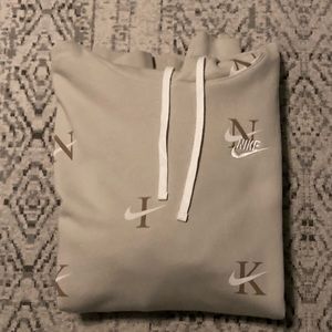 A Nike hoodie brown and tan
